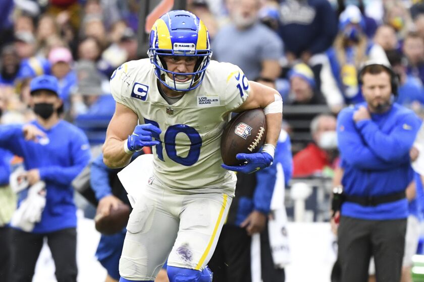Los Angeles Rams wide receiver Cooper Kupp (10) runs the ball during the fourth quarter.