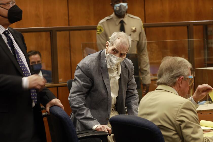 INGLEWOOD, CA - SEPTEMBER 08: Robert Durst looks at jurors walking into the courtroom as he appears in an Inglewood courtroom with his attorneys for the first closing arguments presented by the prosecution in the murder trial of the New York real estate scion who is charged with the longtime friend Susan Bermans killing in Benedict Canyon just before Christmas Eve 2000. Inglewood Courthouse on Wednesday, Sept. 8, 2021 in Inglewood, CA. (Al Seib / Los Angeles Times).