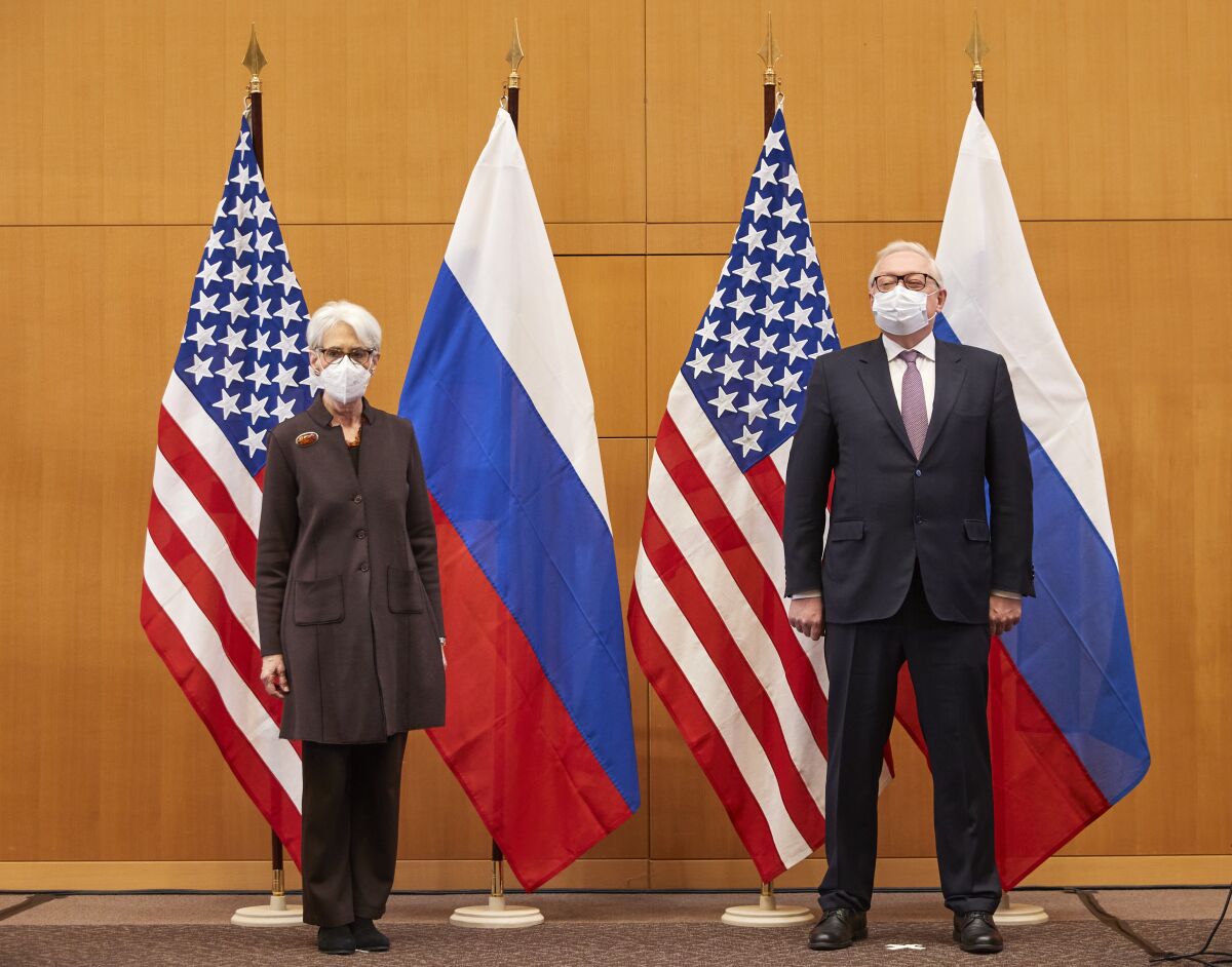US Deputy Secretary of State Wendy Sherman, left, and Russian deputy foreign minister Sergei Ryabkov attend security talks at the United States Mission in Geneva, Switzerland, Monday, Jan. 10, 2022. (Denis Balibouse/Pool via AP)