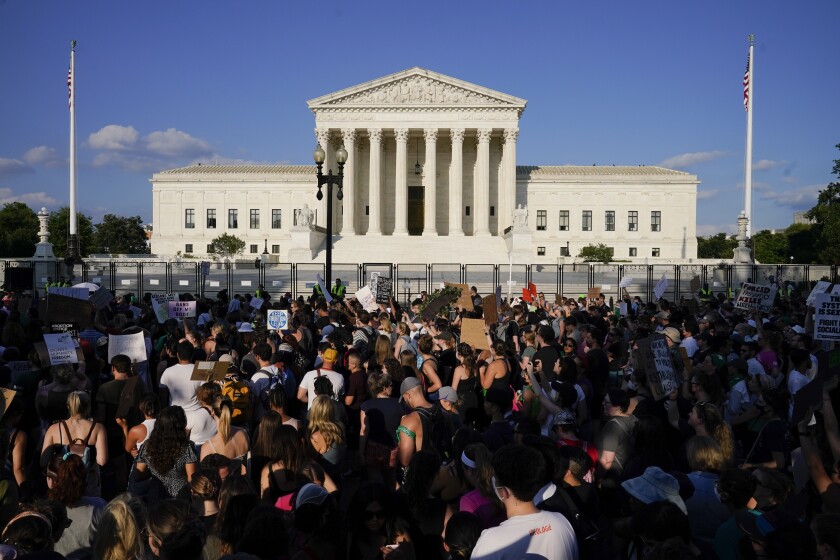 Protesters fill the street in front of the Supreme Court after the court's decision to overturn Roe v. Wade.