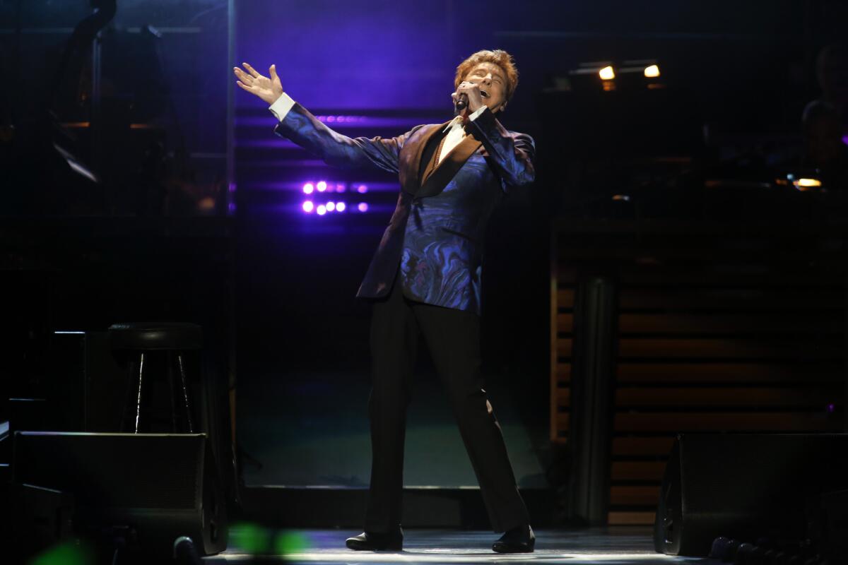Barry Manilow performs Tuesday night at Staples Center in Los Angeles.