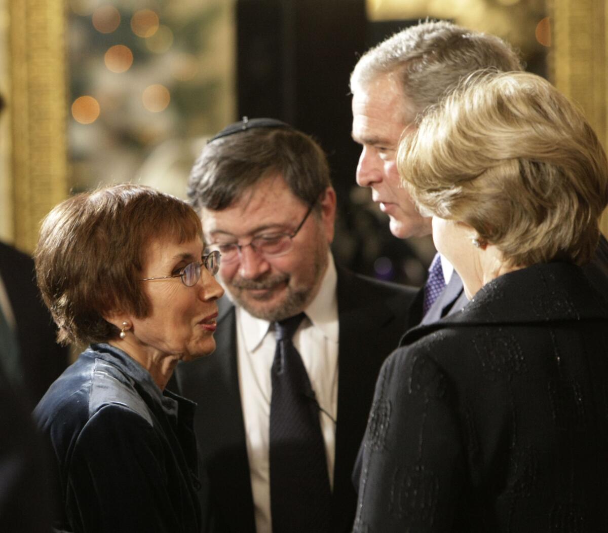Ruth Pearl and her husband Judea Pearl, center, talk with President George W. Bush at the White House