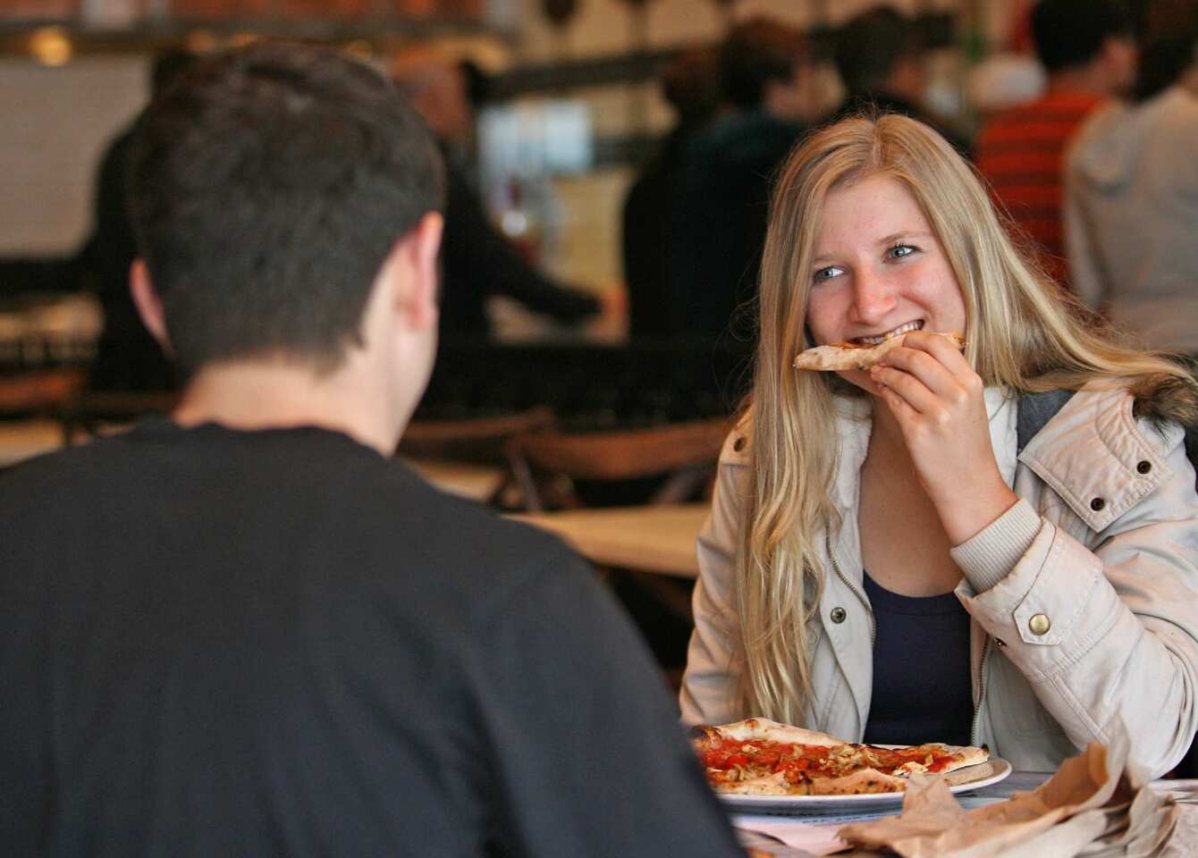 800 Degrees Neapolitan Pizzeria in Westwood Village: UCLA students Sam Zabb, left, and Laura Gustafson, right enjoy the pizza.
