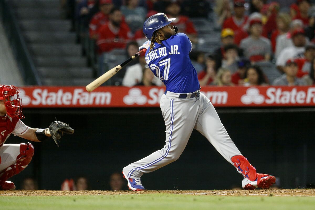 Toronto Blue Jays DH Vladimir Guerrero Jr. hits a solo home run off of Angels pitcher Shohei Ohtani.