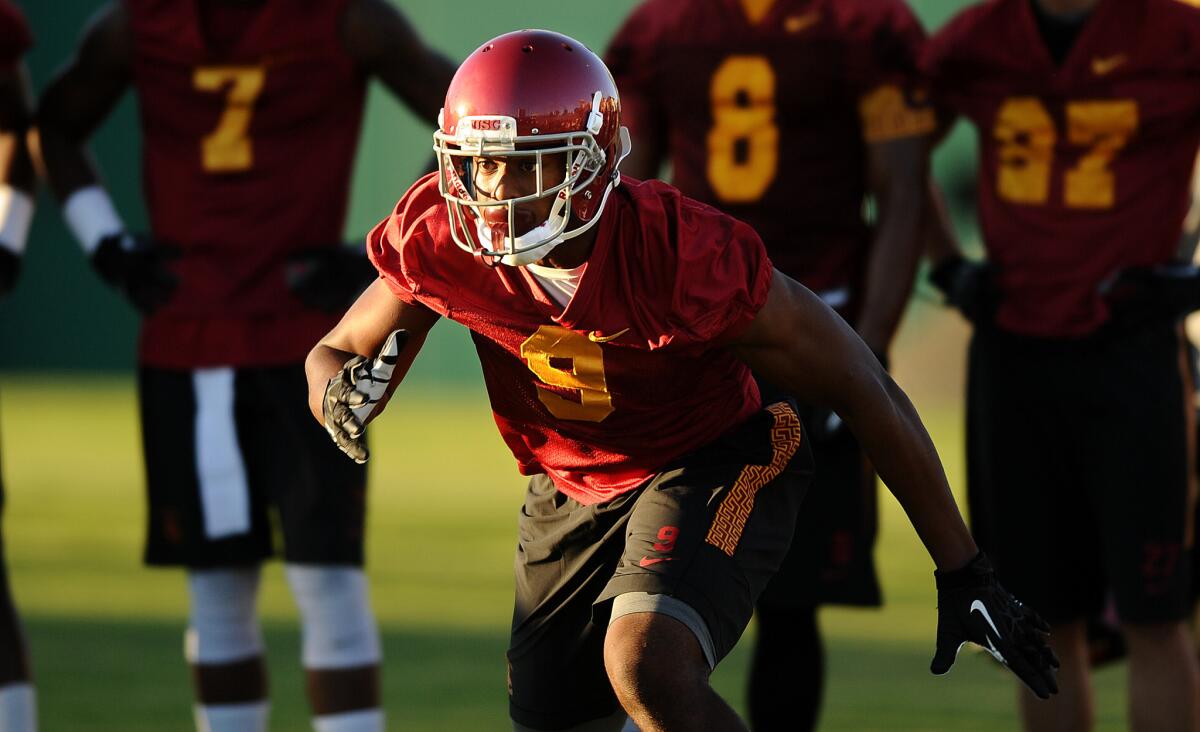 USC receiver JuJu Smith runs up field during a practice on Aug. 4.