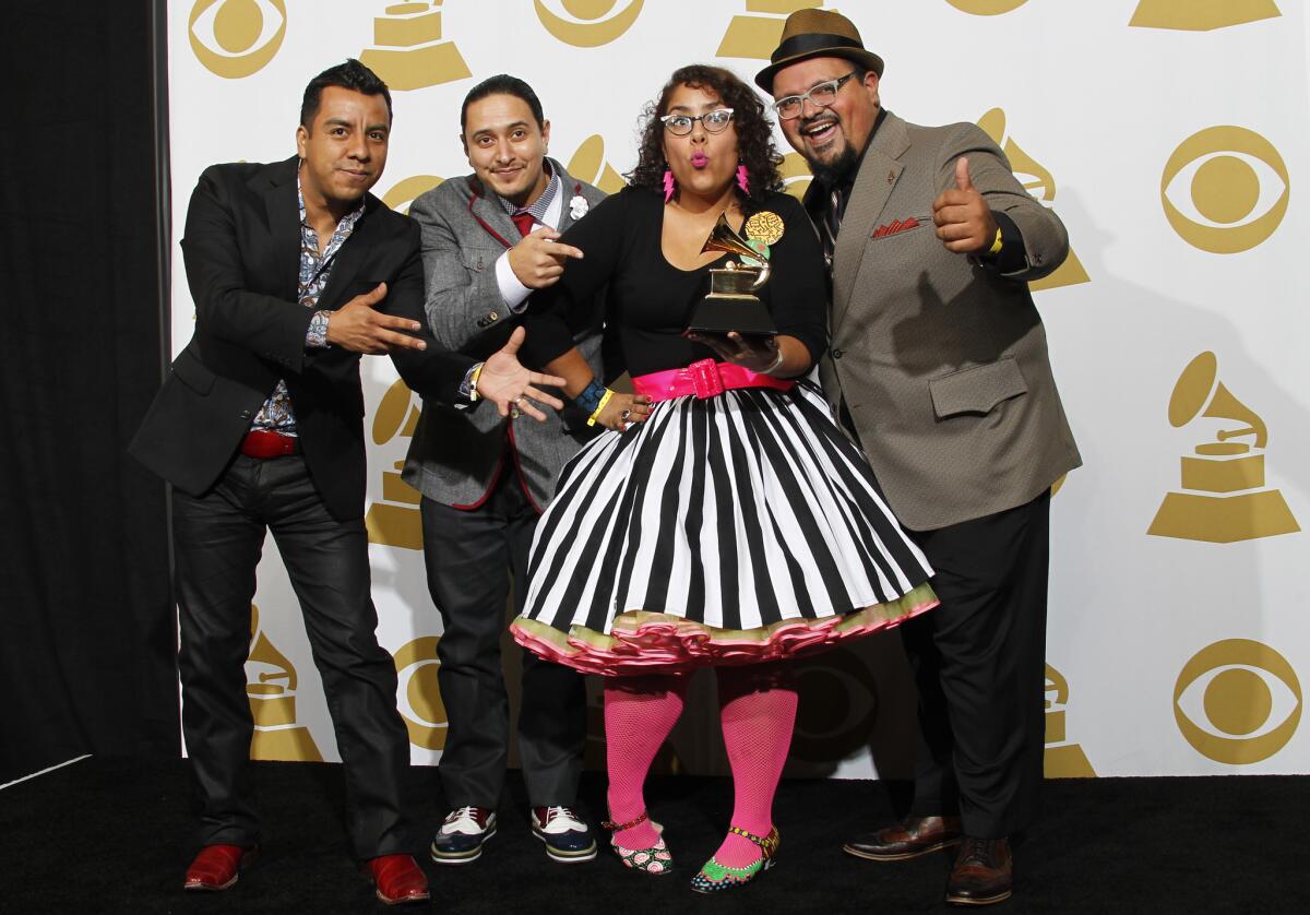 La Santa Cecilia after their 2014 Grammy win for Best Latin Rock, Urban or Alternative Album.