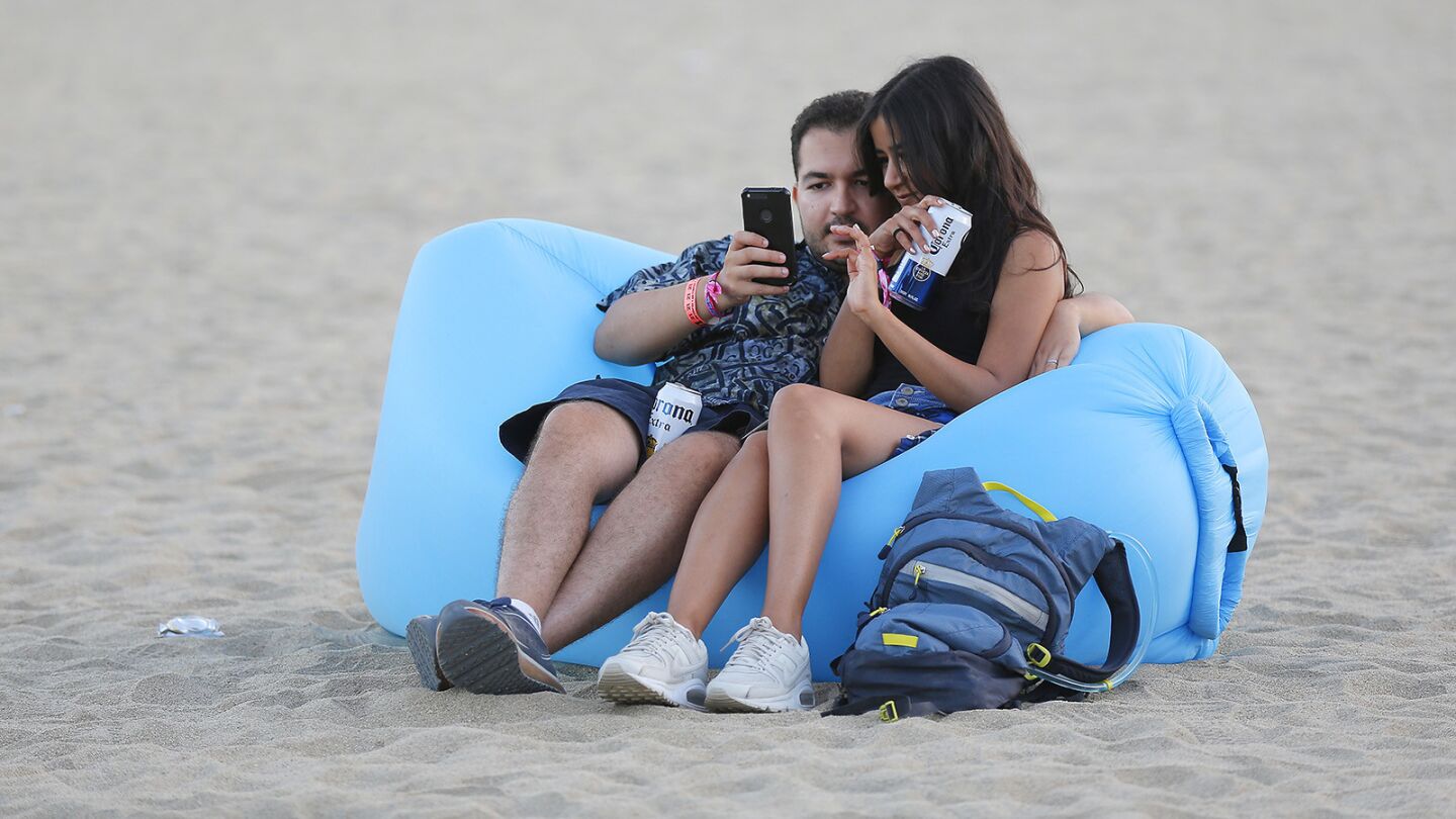 Fans relax as they wait for the band N.E.R.D to start at KAABOO Del Mar on Saturday, September 15, 2018. (Photo by K.C. Alfred/San Diego Union-Tribune)