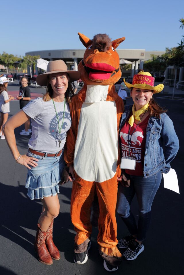 PTA president Sara Lake, Mustang Mascot, principal Chelsea Moore