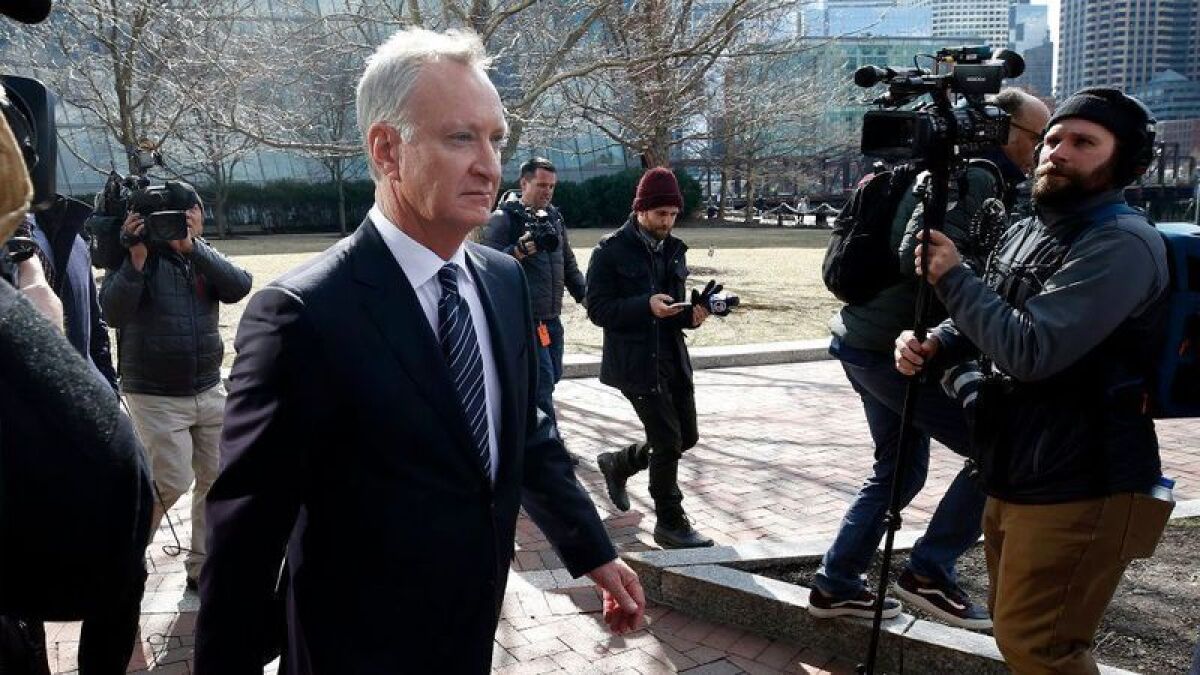 Toby MacFarlane leaving federal court in Boston in April. The Del Mar executive pleaded guilty Friday to fraud conspiracy.