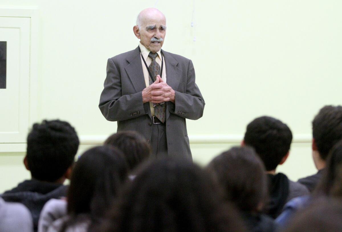Holocaust survivor Herbert Murez, 92, spoke about his experience escaping from the Nazis at age 14, during a Holocaust survivor talk to eighth graders at Muir Middle School in Burbank on Thursday, April 7, 2016.