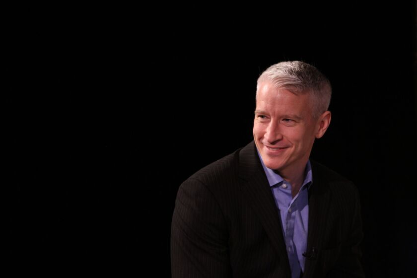CNN anchor Anderson Cooper, pictured, and documentarian Ken Burns both found out in an episode of Finding Your Roots" this season that in the 19th century, their family lines contained slaveholders.