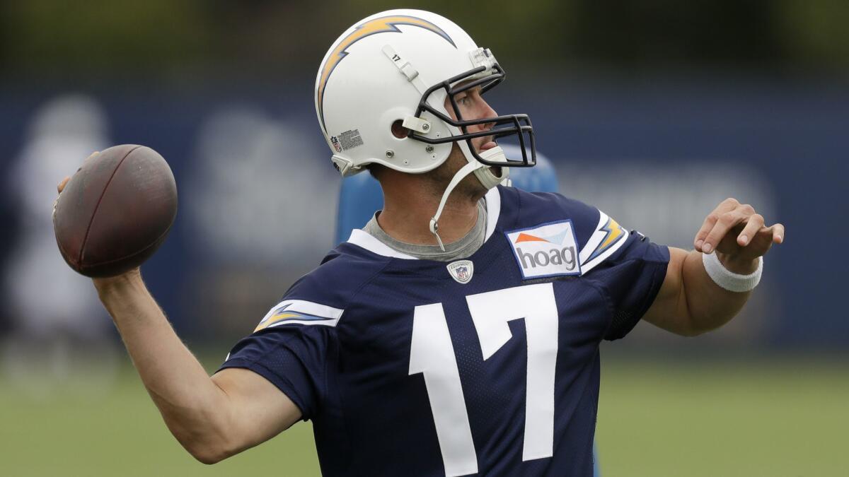 Chargers quarterback Philip Rivers throws during practice.