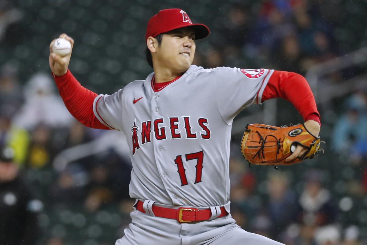 Angels right-hander Shohei Ohtani pitches against the Minnesota Twins on Sept. 23, 2022, in Minneapolis.