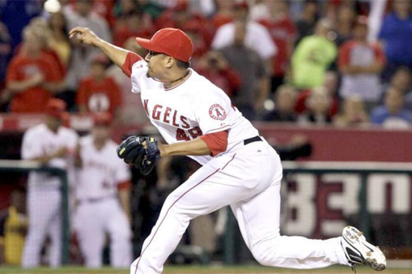 Ernesto Frieri ended spring training with his best performance of the Cactus League season, retiring the side in the ninth inning of the Angels' 6-3 win over the Texas Rangers.