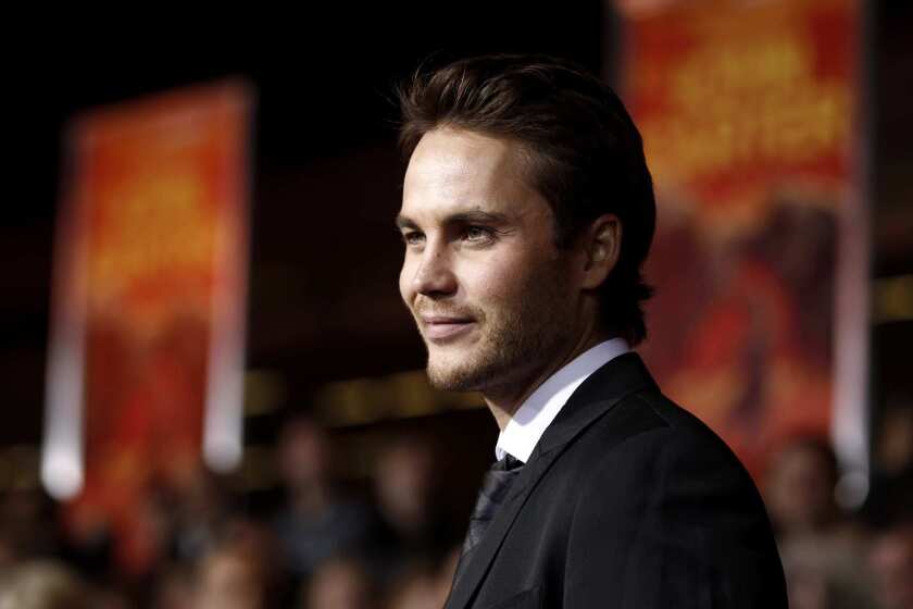 Taylor Kitsch, who plays the titular character in Disney's "John Carter," arrives at the film's premiere on Feb. 22 at L.A. Live in Los Angeles. In the film, Kitsch plays a Civil War veteran who leaps through time and is transplanted on Mars, where he finds himself imprisoned by giant barbarians. The story is based on the adventure hero created 100 years ago by writer Edgar Rice Burroughs, who wrote 11 novels about John Carter's battles and discoveries on Mars. The novels have inspired many fantasy filmmakers including George Lucas, James Cameron and "John Carter" director Andrew Stanton.