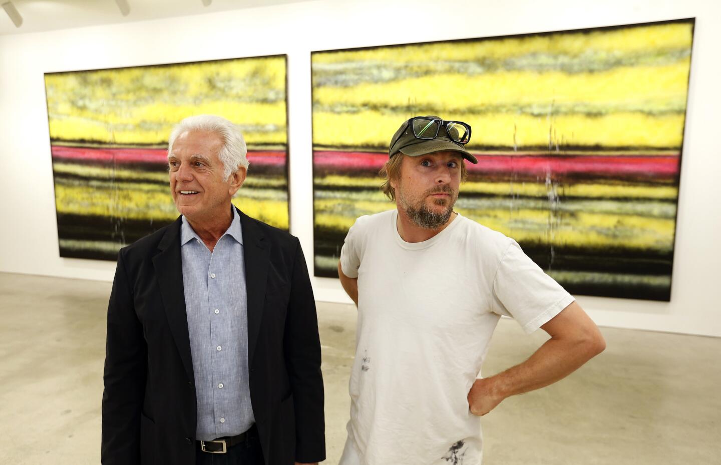 Maurice Marciano, left, founder of the Marciano Art Foundation, with artist Sterling Ruby, at the fo
