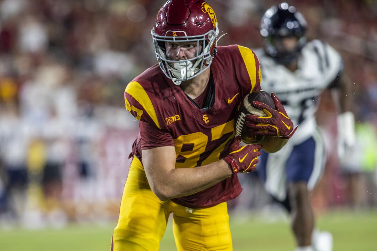 USC tight end Lake McRee catches a pass during the Trojans' win over Utah State on Sept. 7.