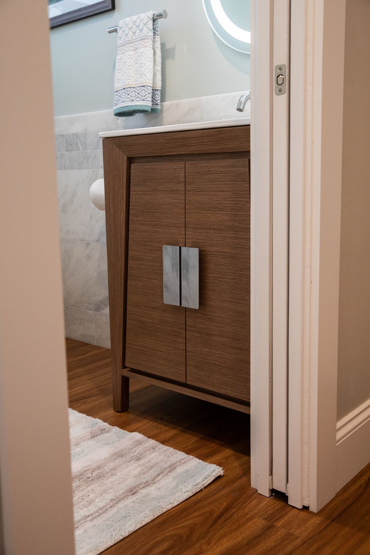 A vanity inside the remodeled half bathroom of Rebecca Zoni-McMakin's home.