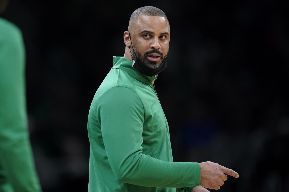 Boston Celtics head coach Ime Udoka points and speaks from the bench during a game.