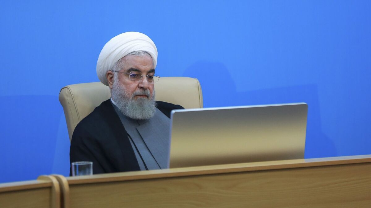 Iranian President Hassan Rouhani attends a meeting with Health Ministry officials in Tehran on June 25.