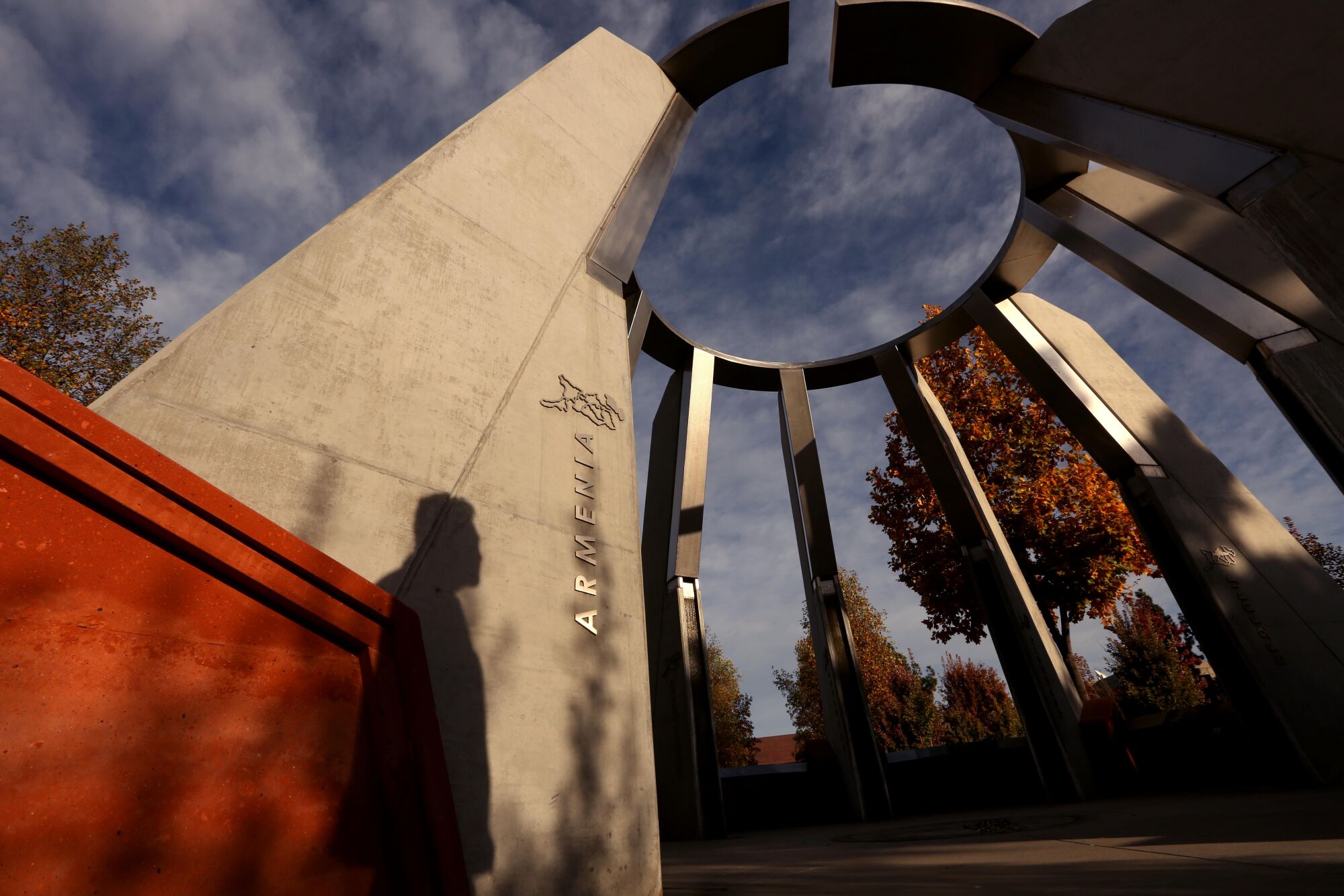A shadow is cast against the Armenian Genocide Centennial Memorial on the campus of California State University Fresno