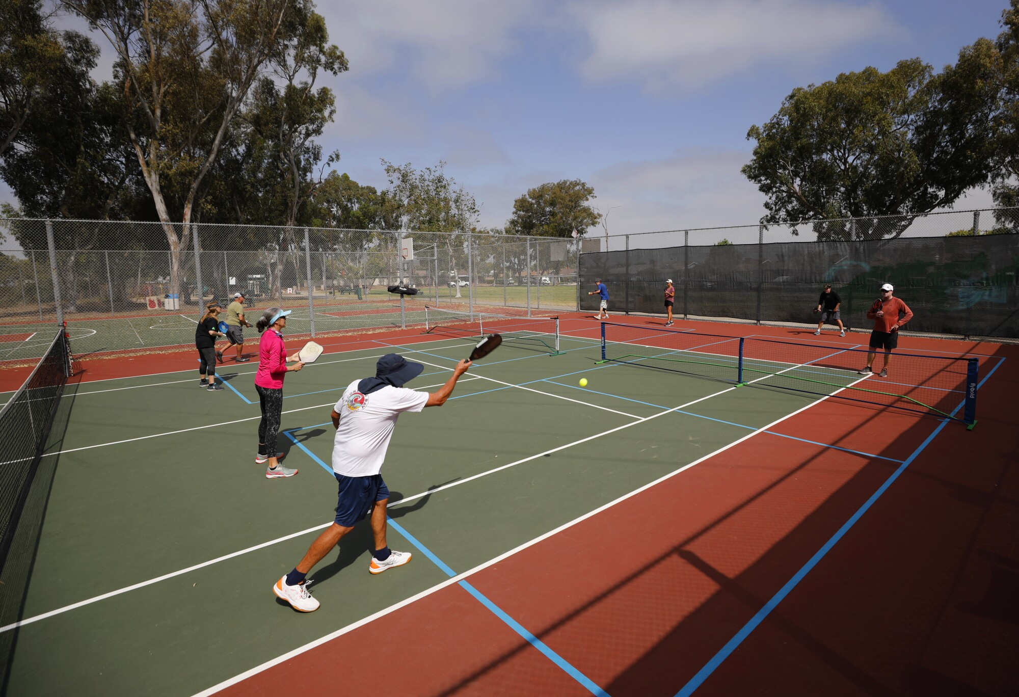 People play pickleball at Gershwin Park in Clairemont on Thursday, June 16, 2022 in San Diego, CA. 