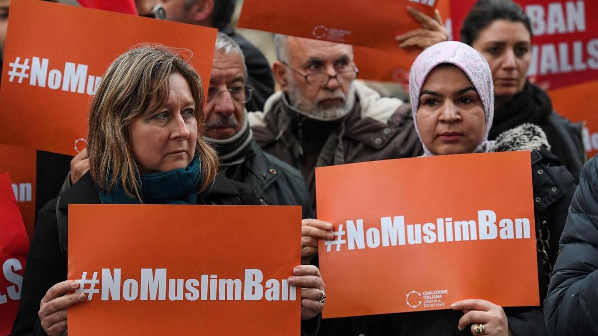 Protesters stage a demonstration against the Trump administration's executive order preventing Muslims from some countries to enter the United States, in front of the US Embassy in Rome on Feb. 2.