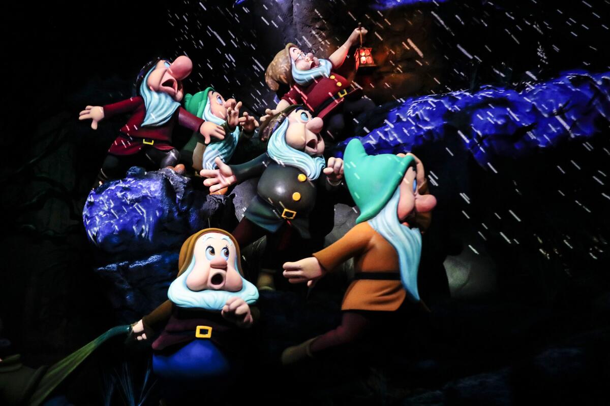 Dwarf figures in Snow White's Enchanted Wish.