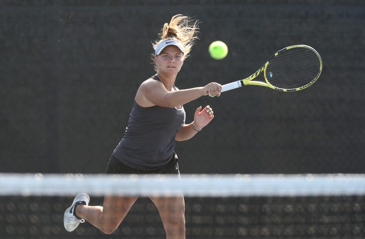 Laguna Beach's Jessica MacCallum competes against Corona del Mar in a CIF Southern Section Division 1 playoff opener.