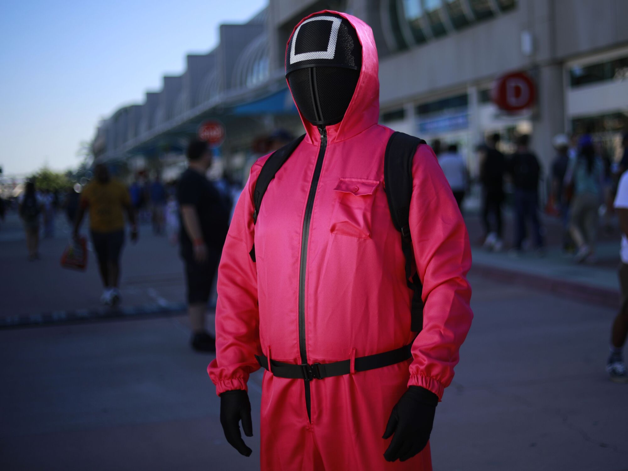 Roger Ho of Los Angeles dressed as a Squid Game Soldier at Comic-Con Special Edition.