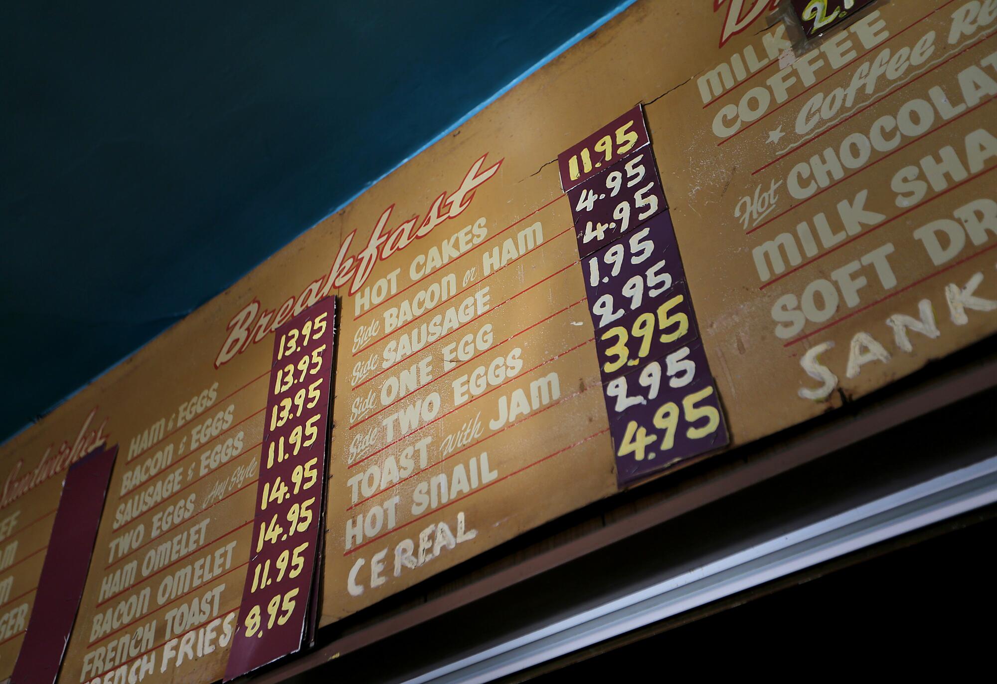A simple menu hangs on the wall at the Silver Crest Donut Shop Restaurant and Bar in San Francisco. 