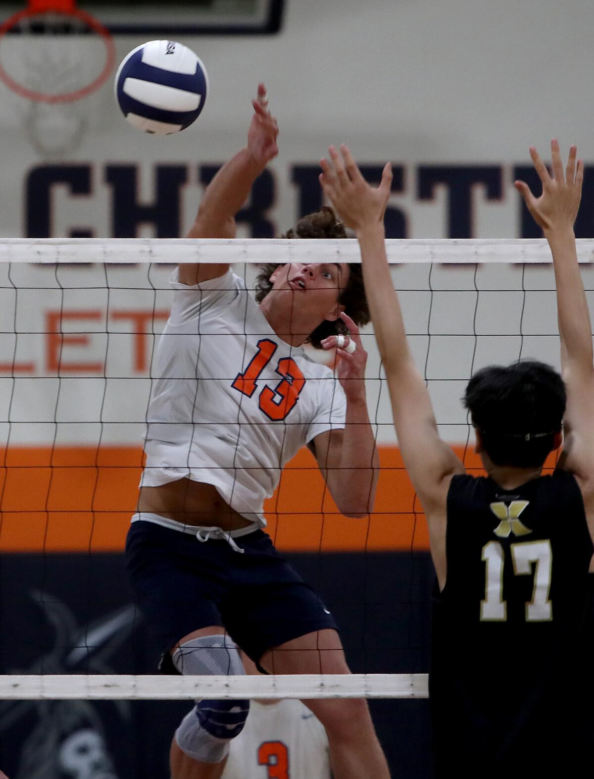 Pacifica Christian's Miller Clark (13) scores against Xavier Prep in the second round of the CIF Division 4 playoffs.