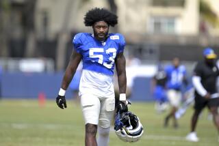 Rams linebacker Ernest Jones walks off the practice field.