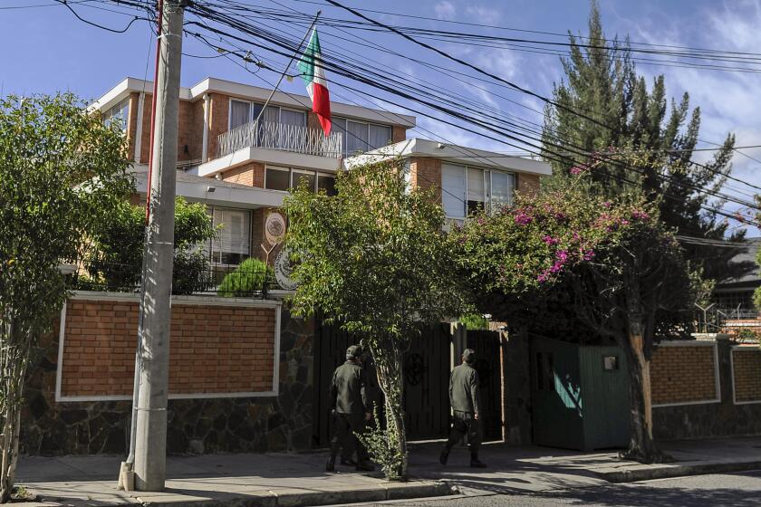 Facade of the Mexican embassy in La Paz, Bolivia, on November 29, 2019. - Bolivia's foreign minister Karen Longaric said Thursday Mexico will face a "very serious problem" if its embassy in La Paz refuses to hand over ex-government officials wanted for arrest, warning they could be there for years. More than 20 former members of ex-president Evo Morales's government have holed up in the Mexican embassy. (Photo by JORGE BERNAL / AFP) (Photo by JORGE BERNAL/AFP via Getty Images)