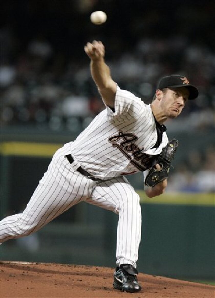 Houston Astros' Roy Oswalt delivers a pitch in the first inning against the Los Angeles Dodgers in a baseball game Monday, June 30, 2008, in Houston. (AP Photo/Pat Sullivan)