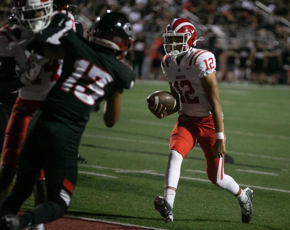 Mater Dei quarterback Elijah Brown runs for a touchdown against Corona Centennial.