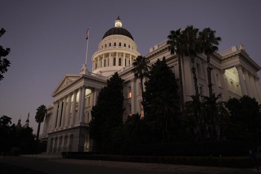 FILE - The lights of the state Capitol glow into the night in Sacramento, Calif., Wednesday, Aug. 31, 2022. An unusually high number of California lawmakers will be gone after the Tuesday, Nov. 8, 2022, election. A quarter of the 40-member Senate is being replaced and 22 members of the 80 member Assembly will be leaving, but the Democrats' overwhelming majorities in both chambers are expected to be safe. (AP Photo/Rich Pedroncelli, File)