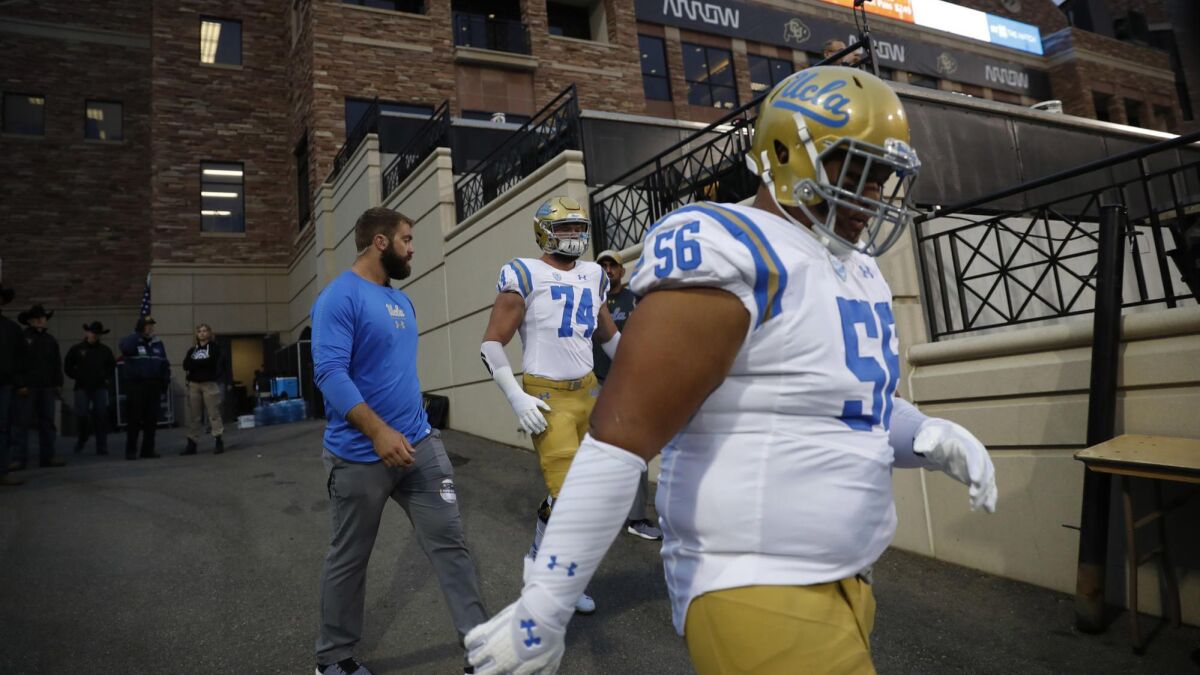 UCLA defensive lineman Atonio Mafi (56) gets ready for a game against Colorado on Sept. 28, 2018 in Boulder, Colo.