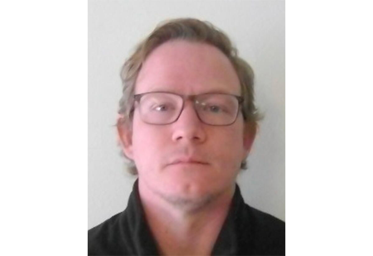 Undated photo provided by the Iowa Department of Corrections shows Sean Gardner after he was arrested.
