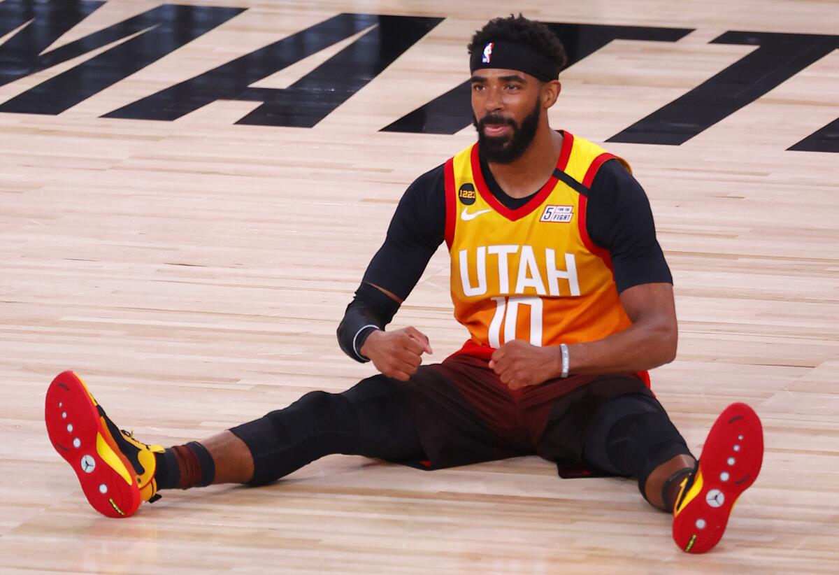 The Jazz's Mike Conley reacts after being fouled during Game 3 of a playoff series against the Nuggets on Aug. 21, 2020.
