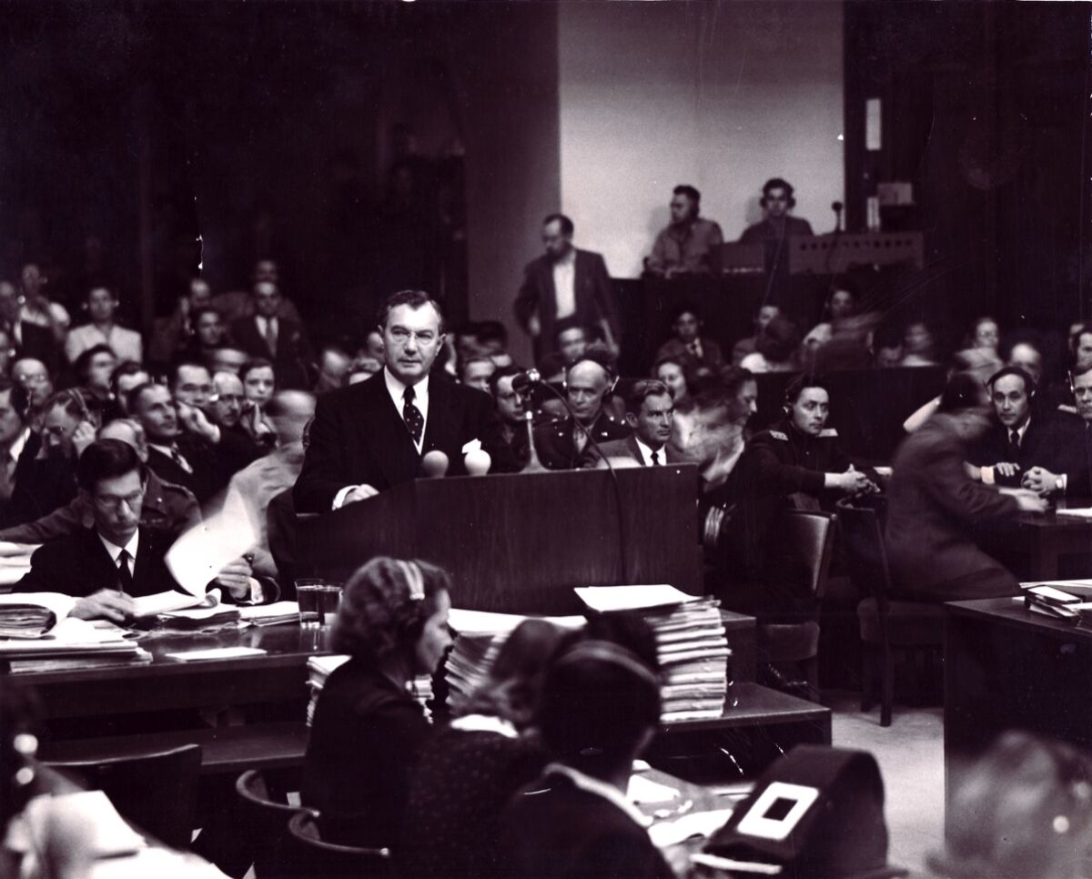 A black-and-white photo of people in a courtroom in 1945.