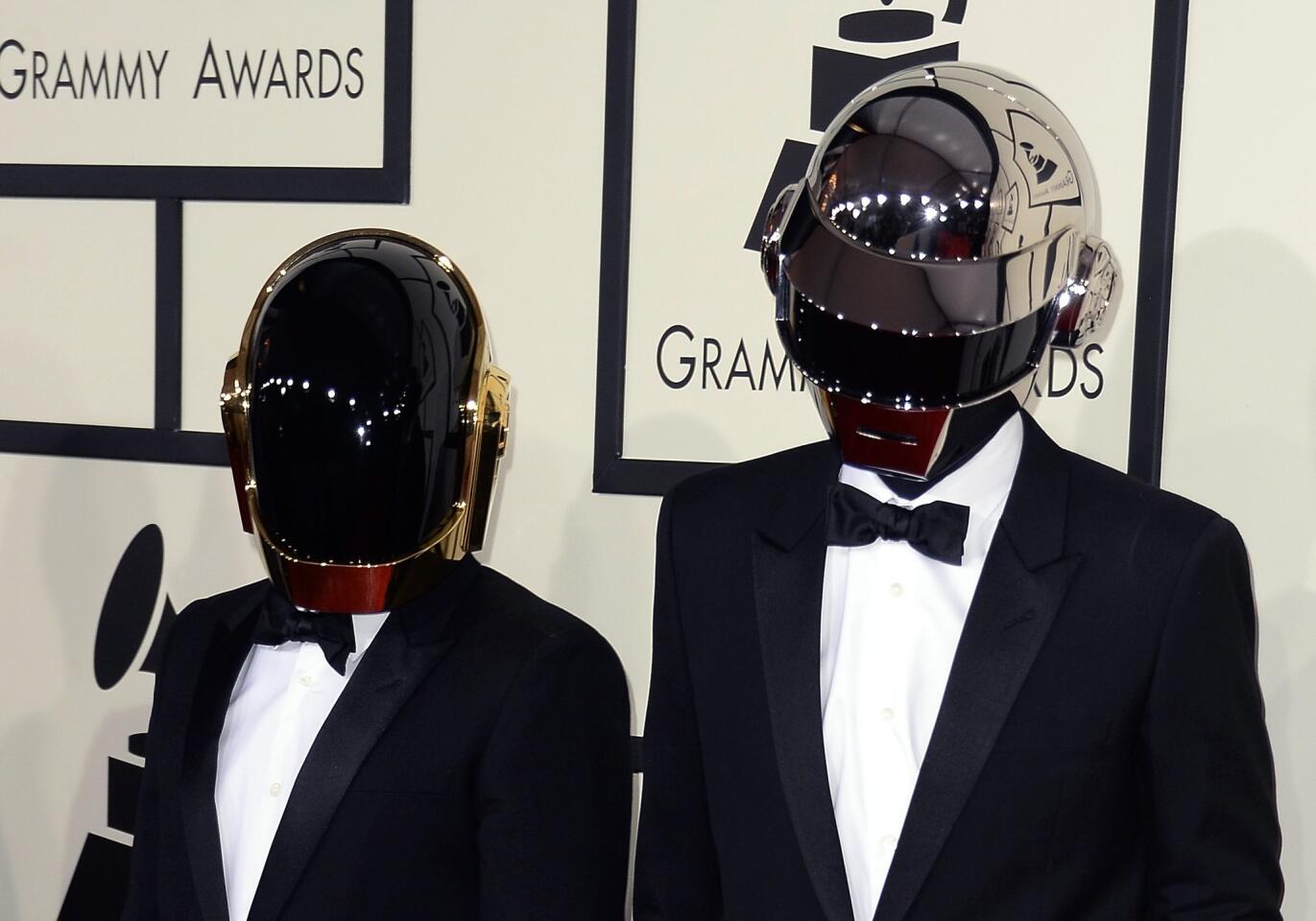 Daft Punk picked up the most coveted award at the Grammys this year for "Random Access Memories," taking home a total of five trophies from the ceremony. The stubbornly silent duo left Pharrell Williams to do all their talking, but who could pay attention with the producer's Twitter-stimulating hat to ogle at? Leave it to collaborator and fellow winner Paul Williams to save the whole night by putting the right words in the robots' mouths.