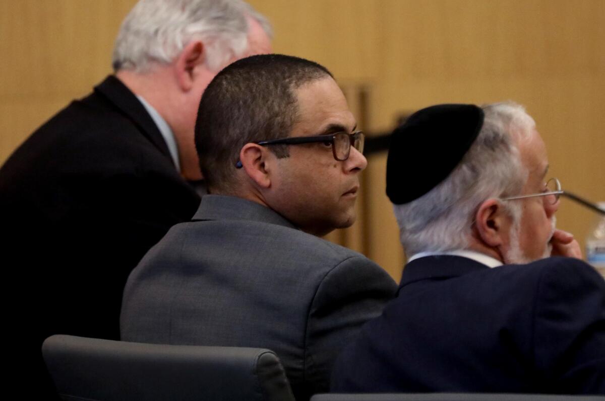 Eddie F. Gonzalez sits in court.