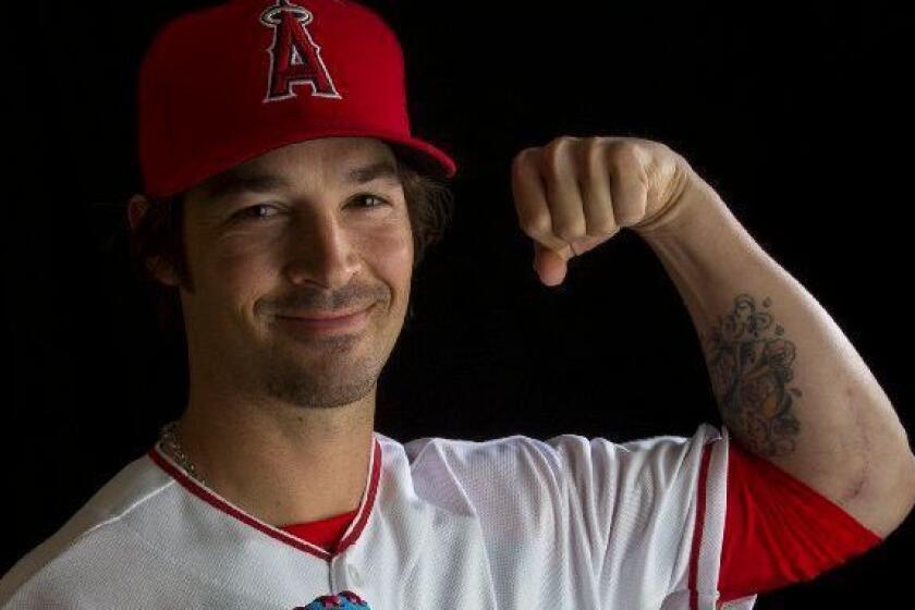 TEMPE, ARIZONA - FEBRUARY 26, 2016: Angels left handed pitcher C.J. Wilson shows off a new tattoo during a portrait session at spring training at Tempe Diablo Stadium on February 26, 2016 in Tempe, Arizona.(Gina Ferazzi / Los Angeles Times)