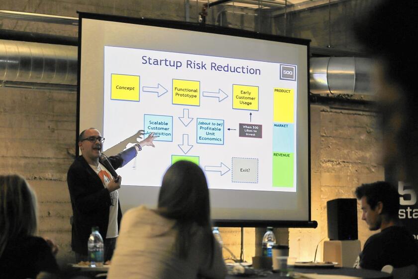 Dave McClure, founding member of 500 Startups, gives a presentation at a San Francisco event in April that brought together tech companies and venture capitalists. Silicon Valley Bank was a sponsor.