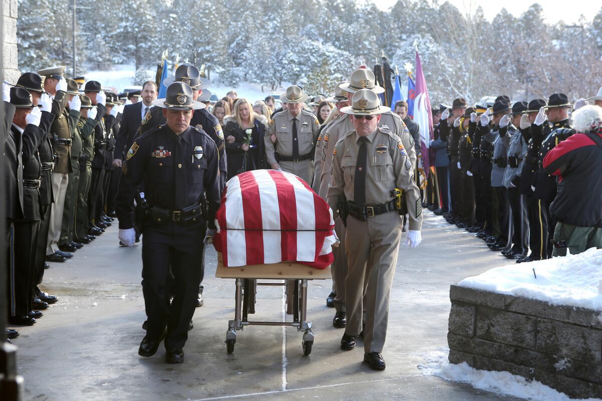 The casket of Flagstaff, Ariz., police Officer Tyler Stewart at his funeral on Jan. 2.