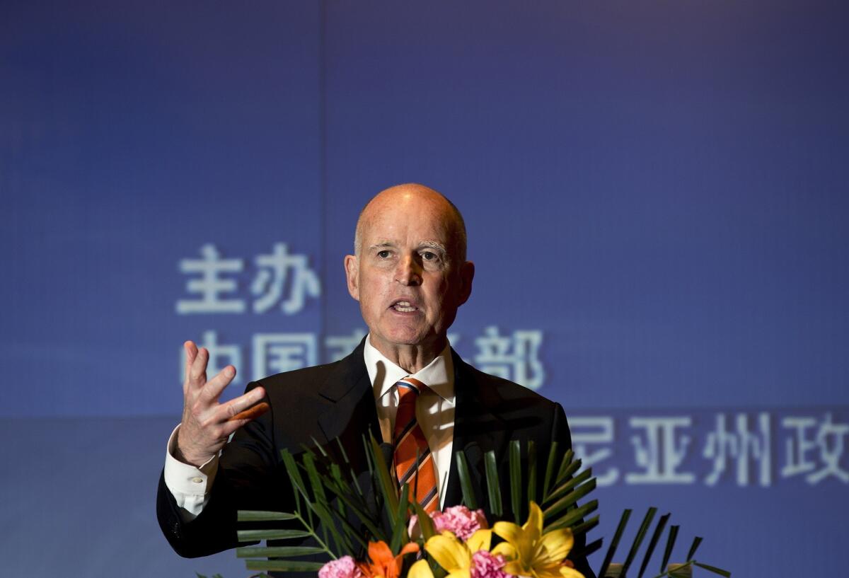 Gov. Jerry Brown speaks at an event in Beijing in 2013.