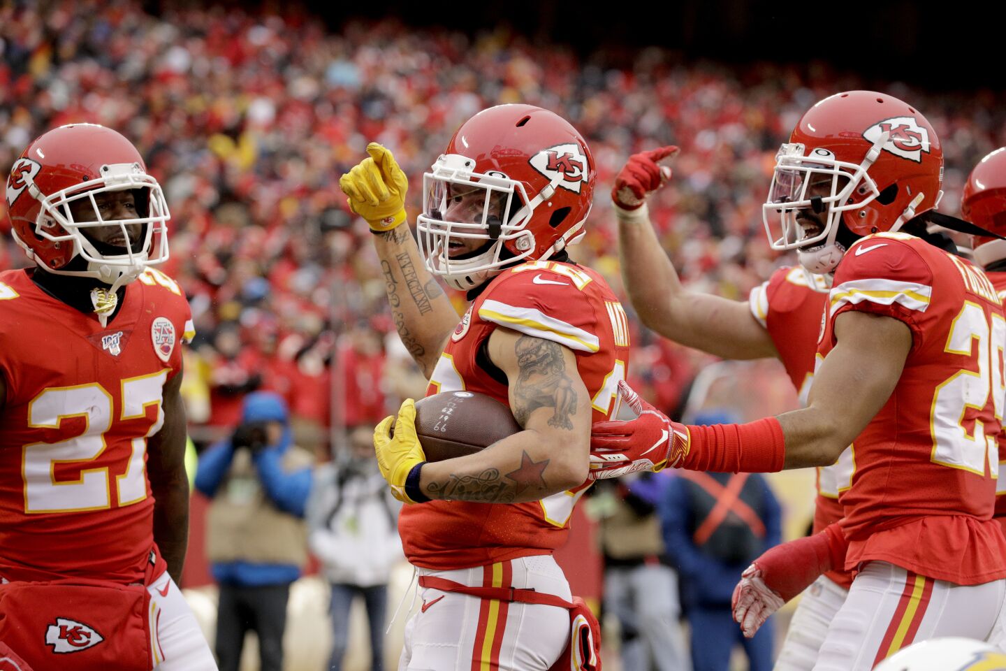 Chiefs safety Tyrann Mathieu celebrates with his teammates after intercepting a pass from Chargers quarterback Philip Rivers during a game Dec. 29.