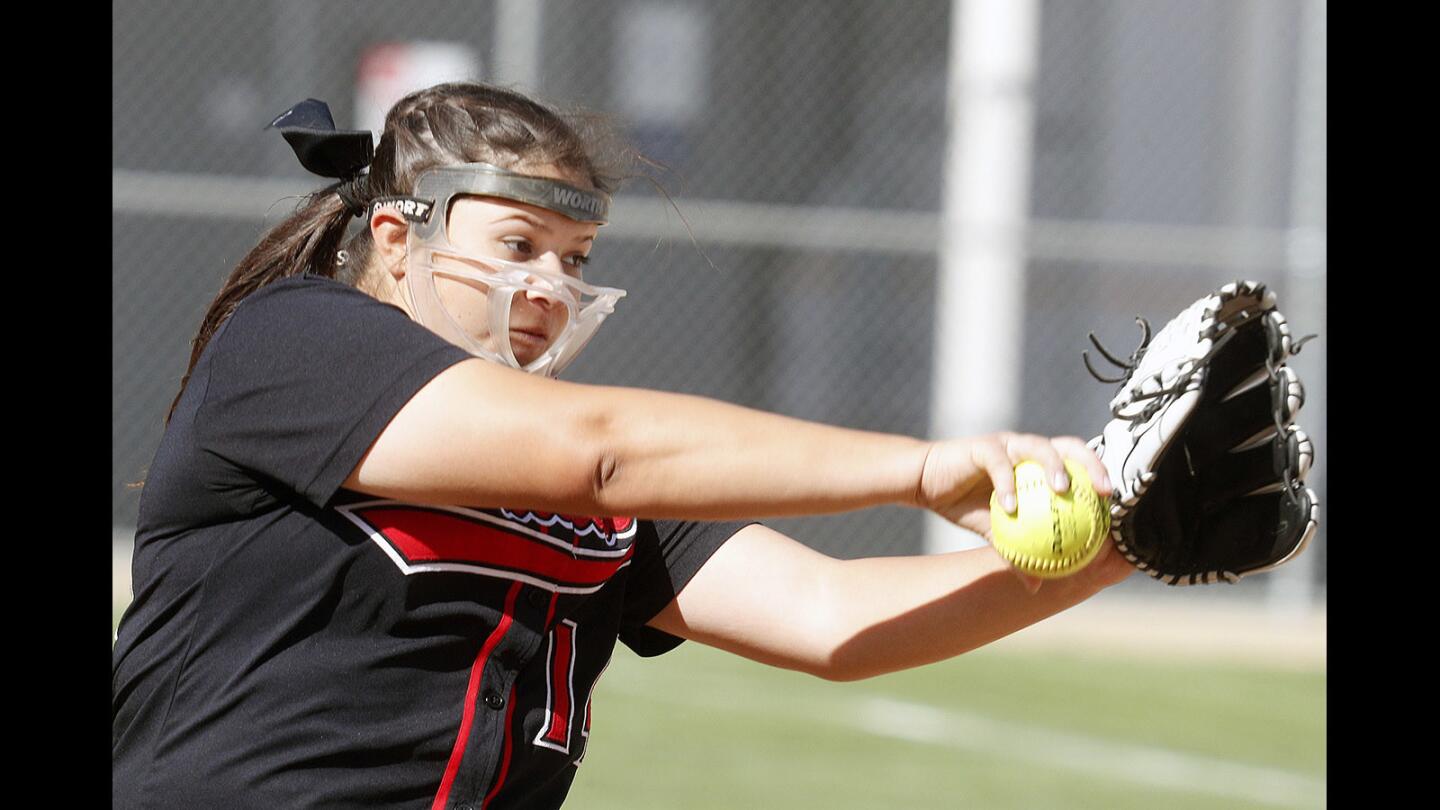 Glendale's pitcher Aurora Funaro makes a pitch against Hoover in a Pacific League softball game at Hoover High School on Thursday, April 12, 2018. Glendale won in five innings 14-0.