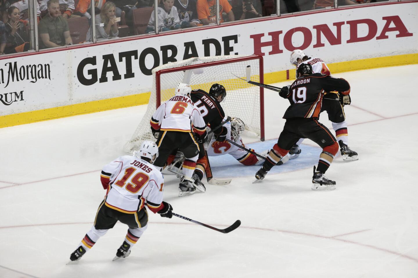 Corey Perry scores the game-winning goal against the Calgary Flames in overtimes, sending the Ducks to the Western Conference finals for the first time since 2007.